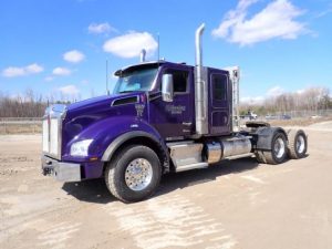 2023 Kenworth T880 Purple Tandem Axle Highway Tractor - I-3203 - Front Driver Side.jpg